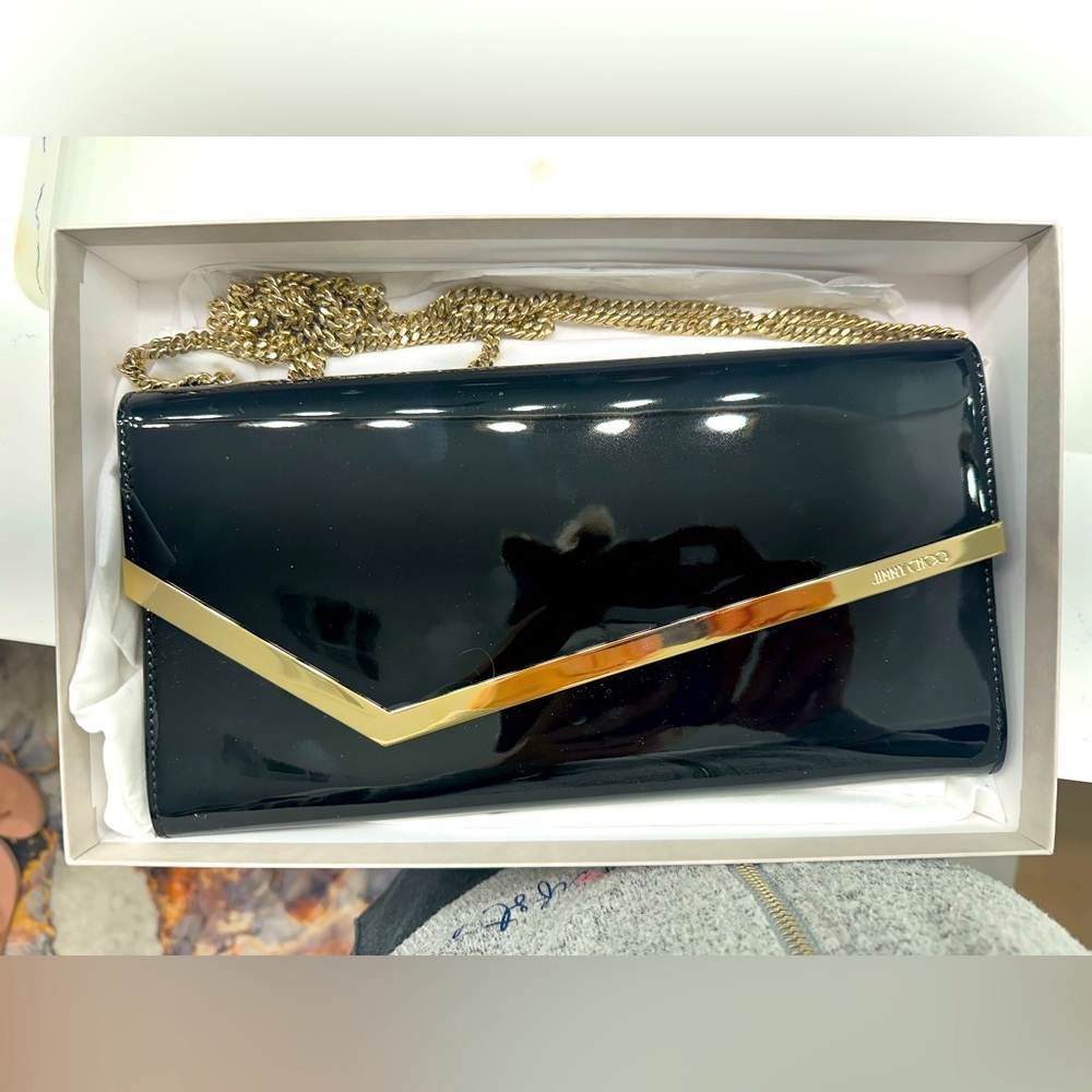 Jimmy Choo classic black bag. 6x11 inches, has two original chains.